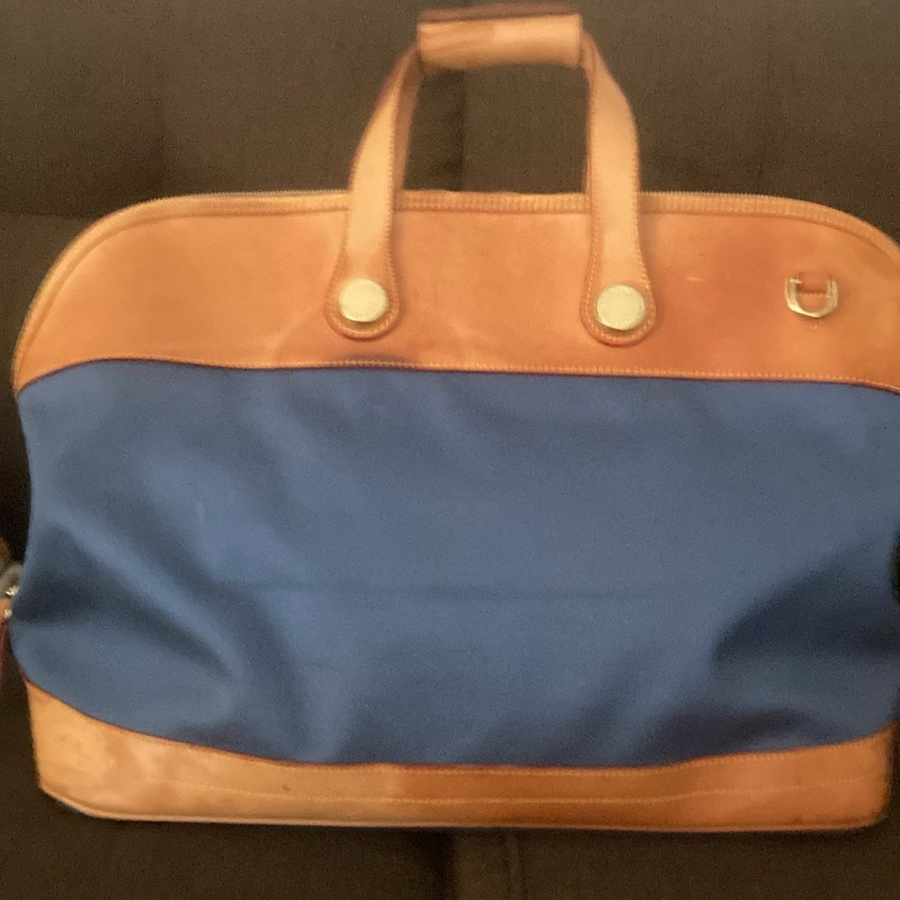 DOONEY & BOURKE Blue & Tan large travel bag.